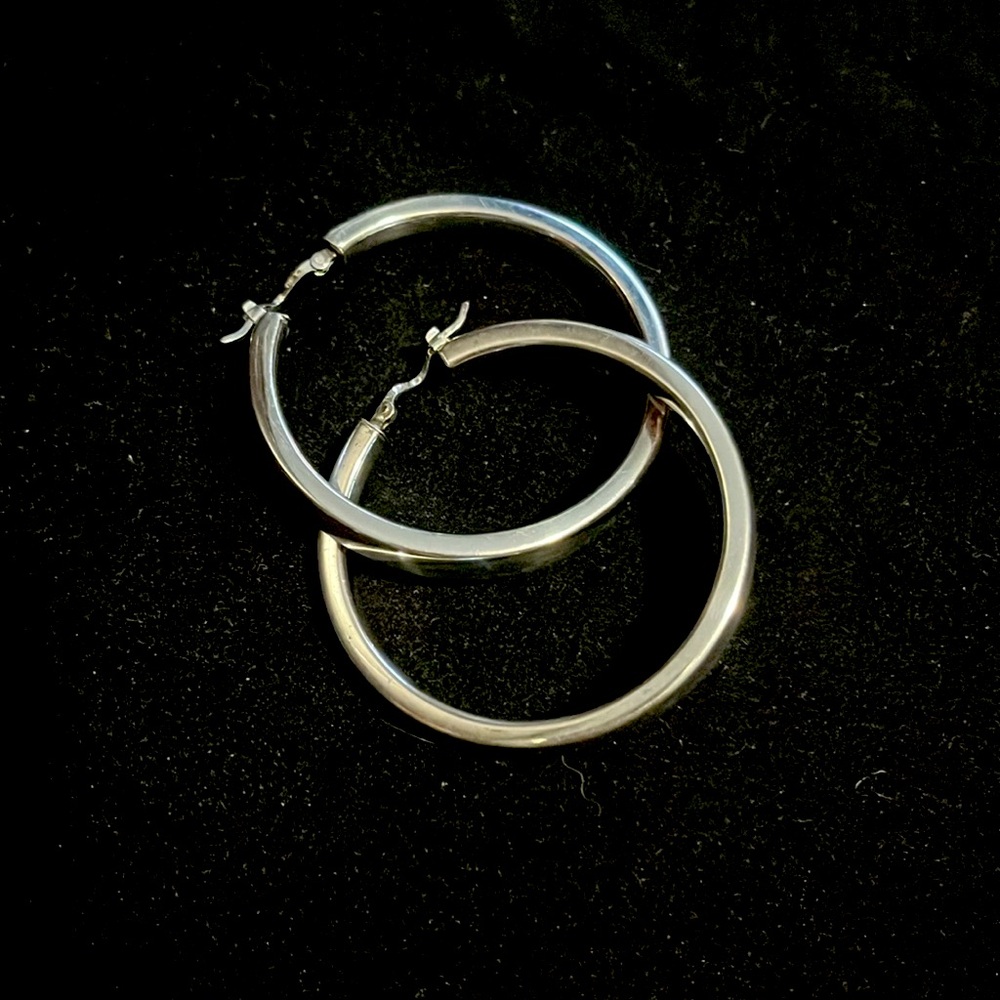 Sterling silver hoop earrings with rhodium plating